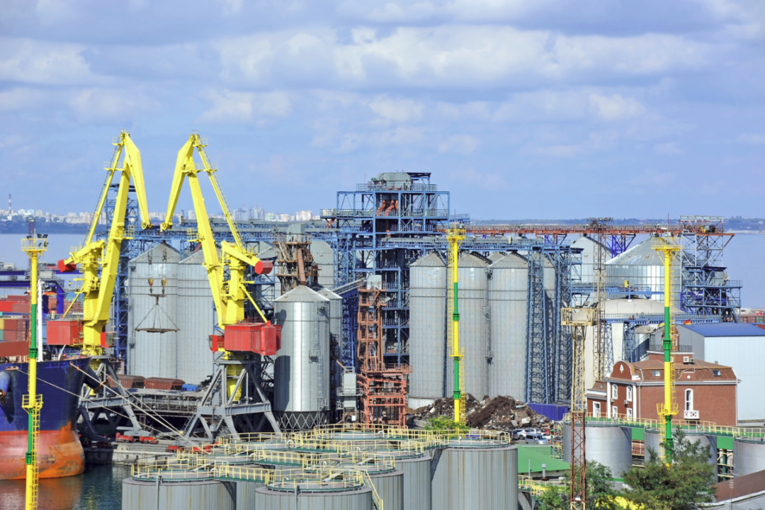 Cargo crane and grain dryer in port Odessa Ukraine