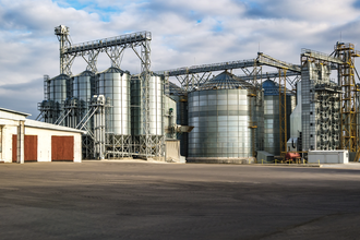 Feed ops improving feed mill efficiency feed mill photo cred adobe stock may e